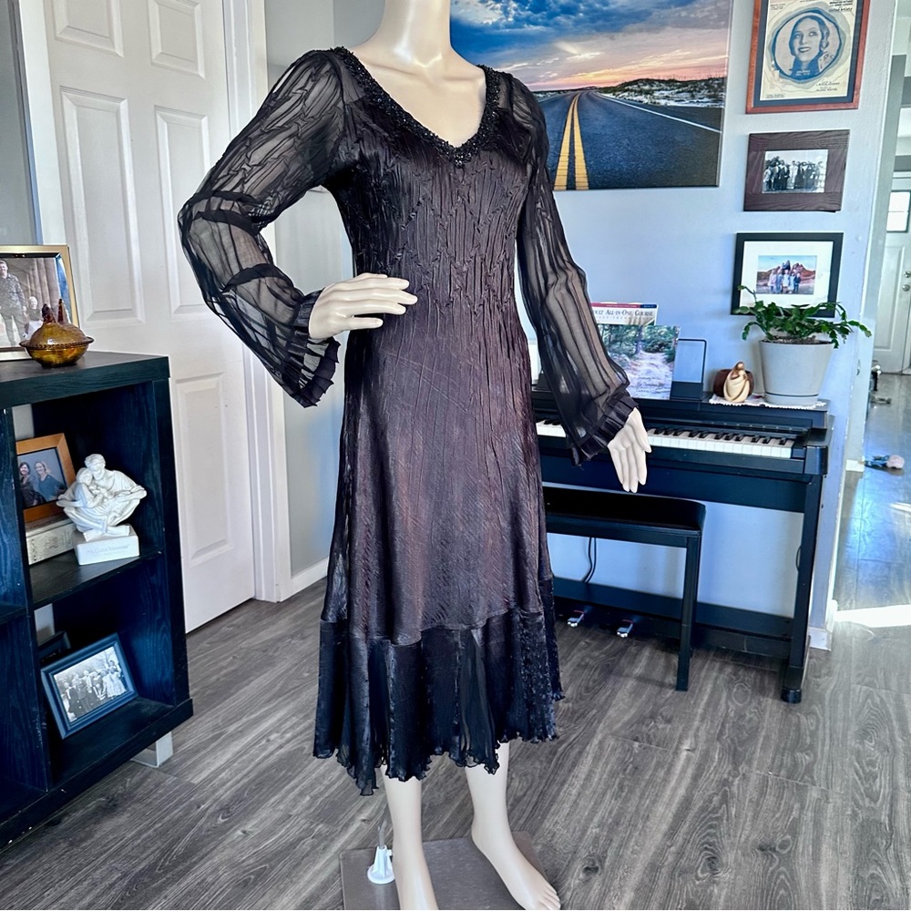 Black Komarov below-the-knee cocktail dress